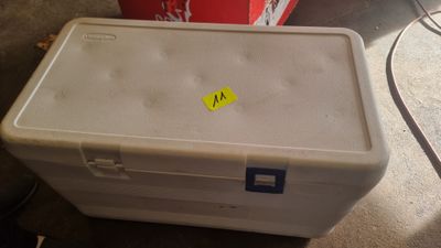 a white box that has a yellow sticker on it