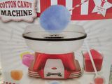 a box of cotton candy machine sitting on a table