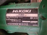 a close up of a green machine with a label on it