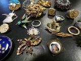 many different types of jewelry on a table
