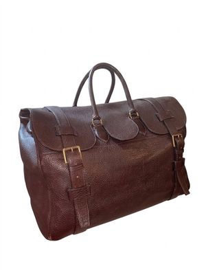 brown leather duffel bag on white background with clipping for text