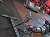 an image of a gym room with a row of stationary exercise bikes