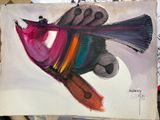 a painting of a colorful bird on a piece of paper