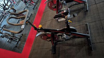 many bikes that are on display in a gym