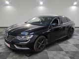 a picture of a black car parked in a garage