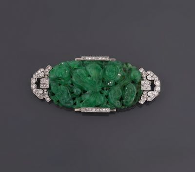 an emerald and diamond broochle broochle
