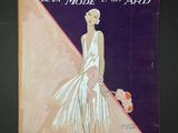 la couverture d'un ancien magazine de mode représentant une femme en robe blanche