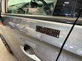 a car that has a sticker on the side of it