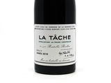 a bottle of wine that is sitting on a table
