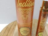 an image of a bottle of lotion sitting on top of a wooden table