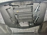 a picture of a car with a bunch of tools inside of it