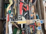a wooden box filled with various tools and tools