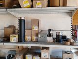 many boxes and boxes on the shelves in the garage