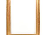 a gold frame on a white wall with a white background