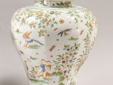 pair of chinese vases with birds and flowers painted on them