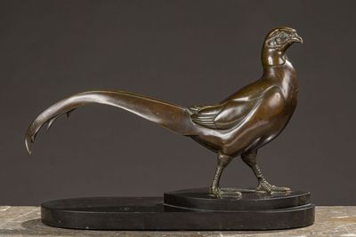 bronze sculpture of a pheasant on a marble base