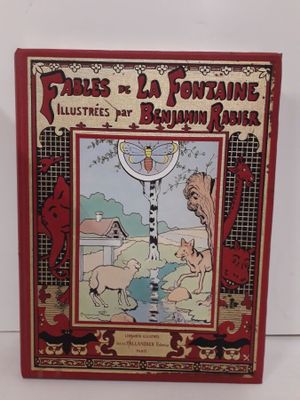 un vieux livre pour enfants avec l'illustration d'un chien et d'un chat