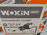 a box with a screwdriver sitting on a table