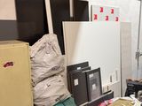 a man standing in a room with luggage on the floor