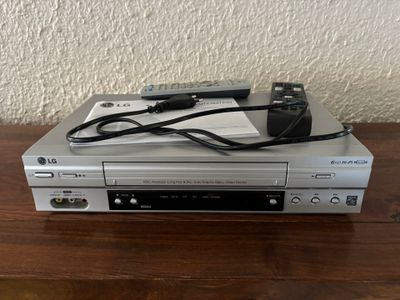 a dvd player that is sitting on top of a table