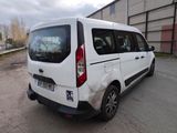 a white van that is parked in a parking lot