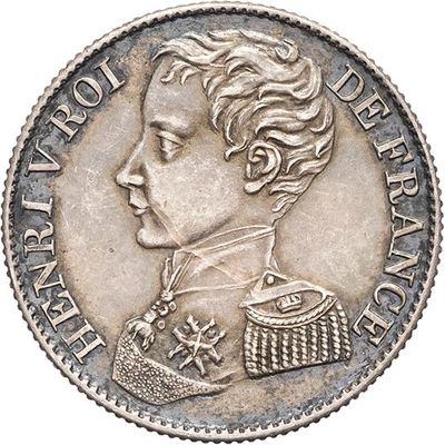 a close up of a coin with a woman ' s face on it