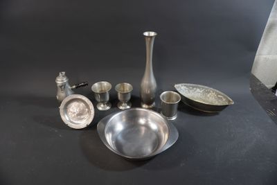 a lot of silver items that are on the table
