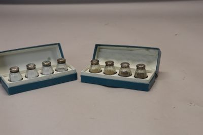 pair of miniature salt and pepper shakers in a blue box