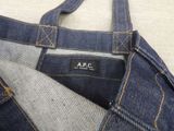 an image of a close up of a pair of jeans on a table