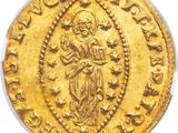 a gold coin with an image of jesus on it