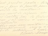 an old handwritten letter from a woman who is holding a cell phone