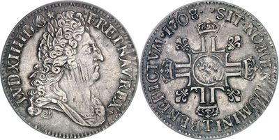 une pièce d'argent avec une croix au recto et une couronne au verso