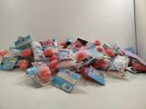 a pile of candy and candy balls on a table