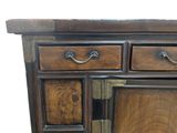 a wooden cabinet with two drawers and a door
