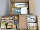 two boxes of assorted toy cars and other items