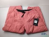 a close up of a pair of pink shorts with a tag on it