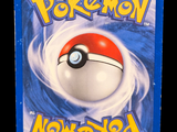 a pokemon card with a red and white ball on it