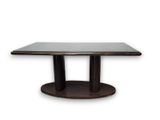 an image of a square dining table with a glass top