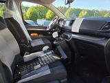 a car with a keyboard and a laptop in it