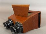 a small wooden toy train that is sitting on a table