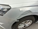 a close up of a car that has a denting on it