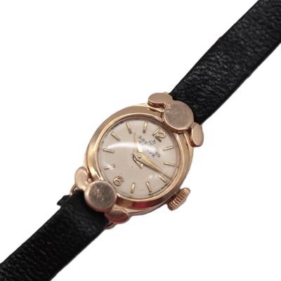 an image of a close up of a wrist watch on a white background