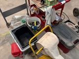 a cart full of items that are sitting on the ground