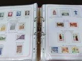 a binder with stamps on it sitting on a table
