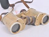 a pair of binoculars that are sitting on a table
