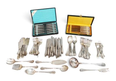 a lot of silverware in a case on a white surface