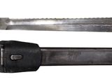 two knives that are sitting next to each other on a table