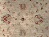 a close up of a rug with a floral design on it