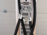an image of a machine with a hose attached to it