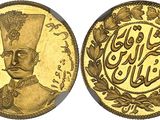 a gold coin with an image of a man in a hat